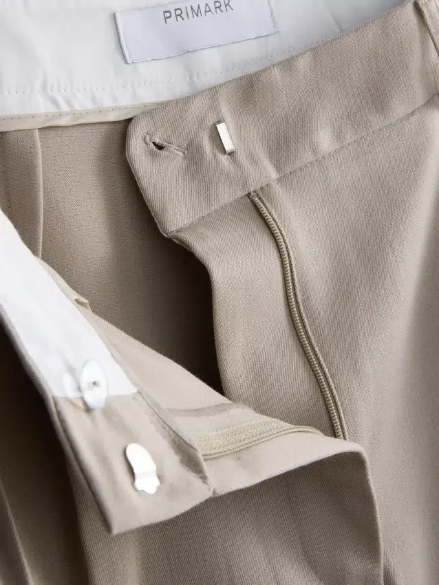 Broek met plooien en wijde pijpen