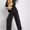 Broek met textuur en losse pasvorm, middelhoge taille