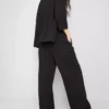 Broek met textuur en losse pasvorm, middelhoge taille