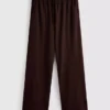 Broek met textuur en wijde pijpen