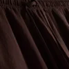 Broek met textuur en wijde pijpen