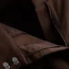 Broek met wijde pijpen, plooien en riemdetail
