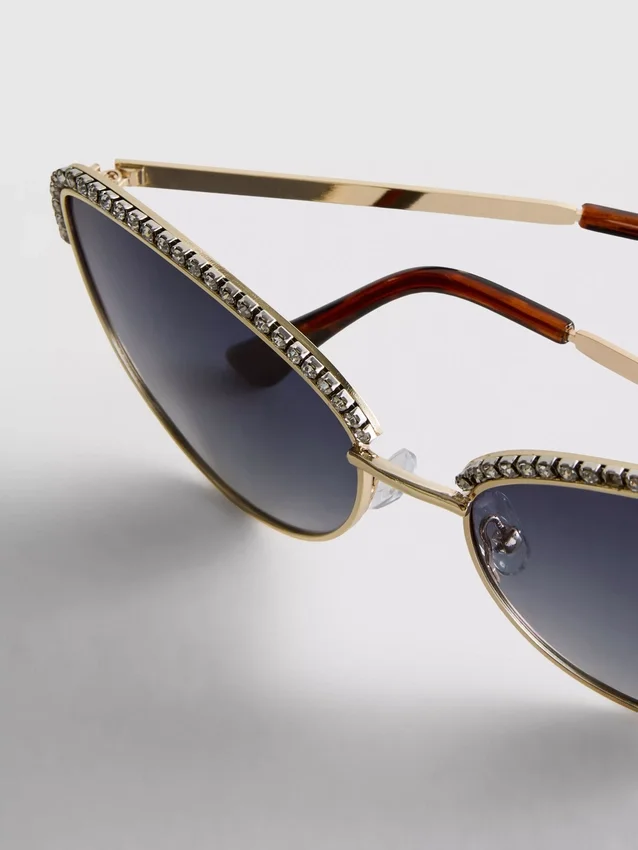 Cat-eye-zonnebril met strass-steentjes