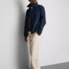 Chino met middelhoge taille en losse pasvorm
