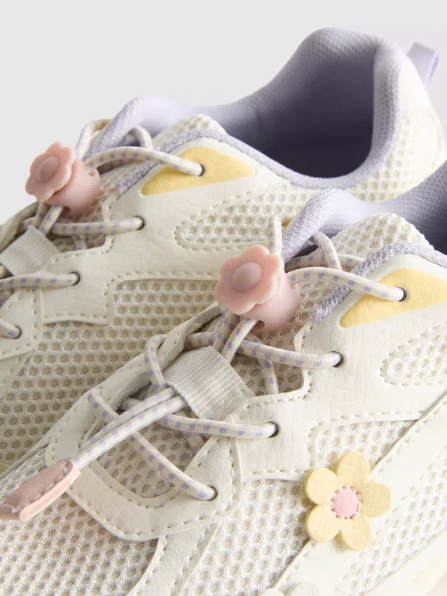 Chunky sneakers met bloemendetails