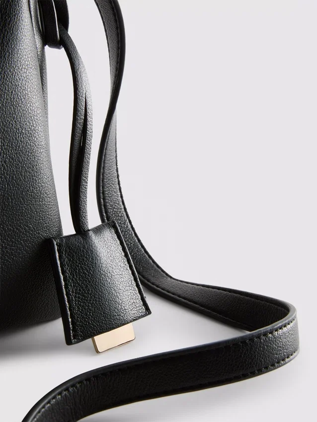 Crossbodytas met dubbele inzetstukken