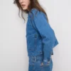 Denimjasje met katoenen opgestikte zak