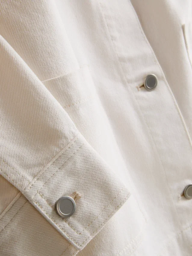 Denimjasje met katoenen opgestikte zak
