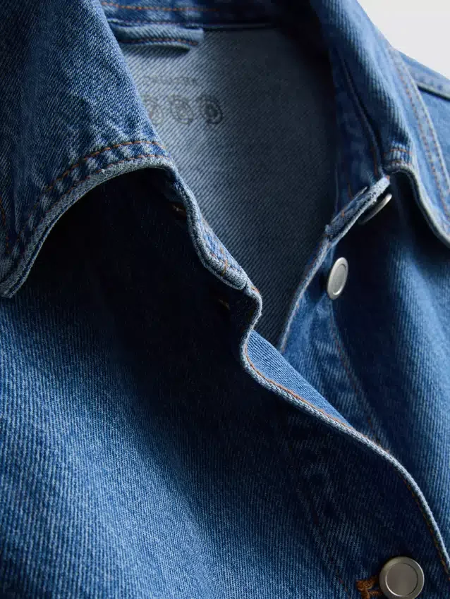 Denimjasje met katoenen opgestikte zak