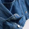 Denimjasje met katoenen opgestikte zak
