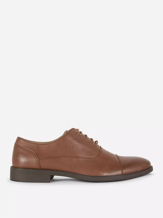 Formele loafers met vetersluiting