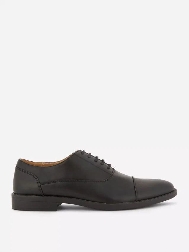 Formele loafers met vetersluiting
