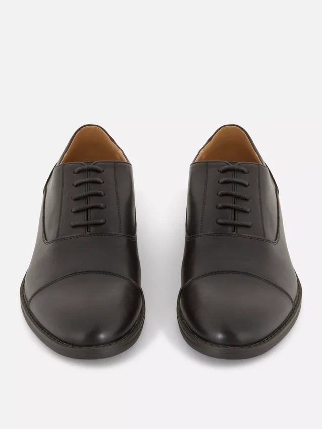Formele loafers met vetersluiting