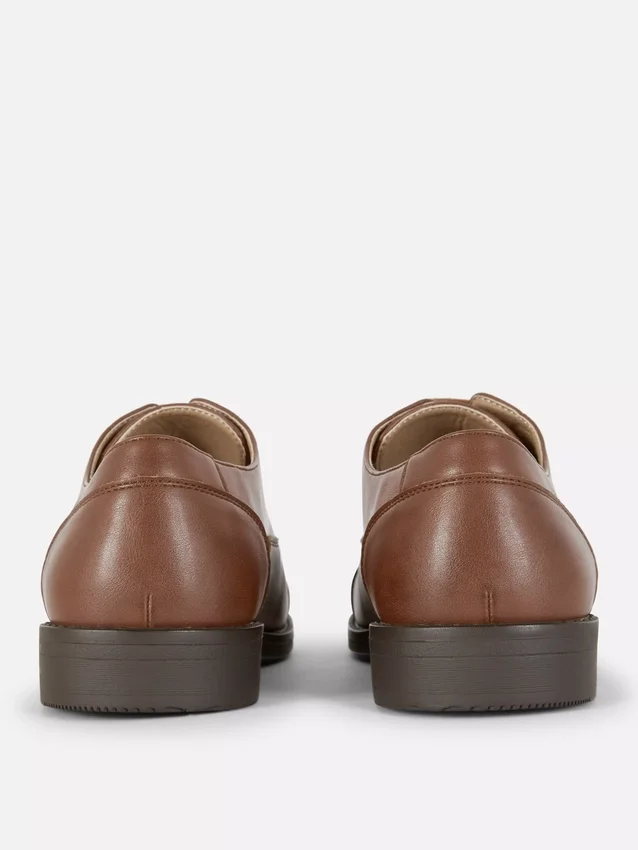Formele loafers met vetersluiting