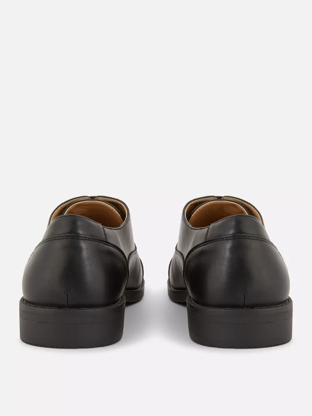 Formele loafers met vetersluiting