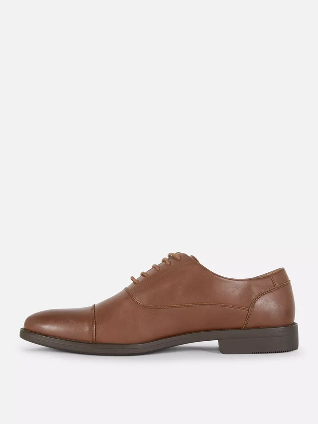 Formele loafers met vetersluiting