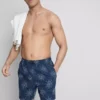 Geborduurde zwemshort met zonmotief