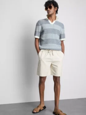 Gebreid poloshirt met gestructureerde strepen