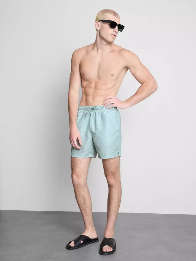 Geometrische zwemshort met waaierpatroon