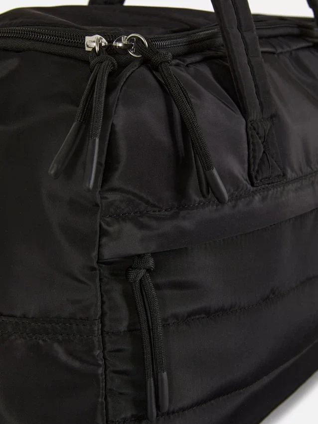 Gewatteerde handbagage voor onder de stoel