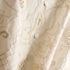 Het Edit-overhemd met geborduurde details en afgeronde zoom