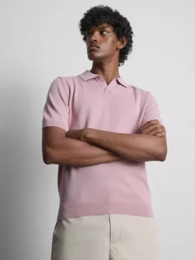 Het gebreide poloshirt van The Edit