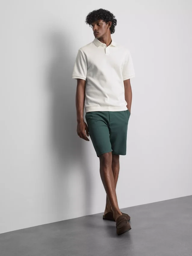 Het geribde poloshirt van The Edit