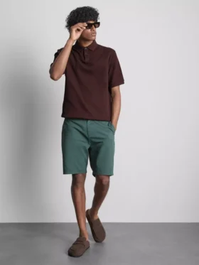 Het geribde poloshirt van The Edit