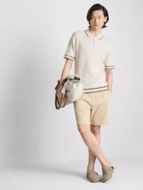 Het The Edit-poloshirt met rits en textuur