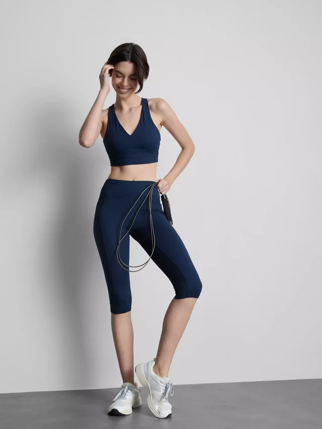 Hooggetailleerde, soepele, ondersteunende sportcapri-legging