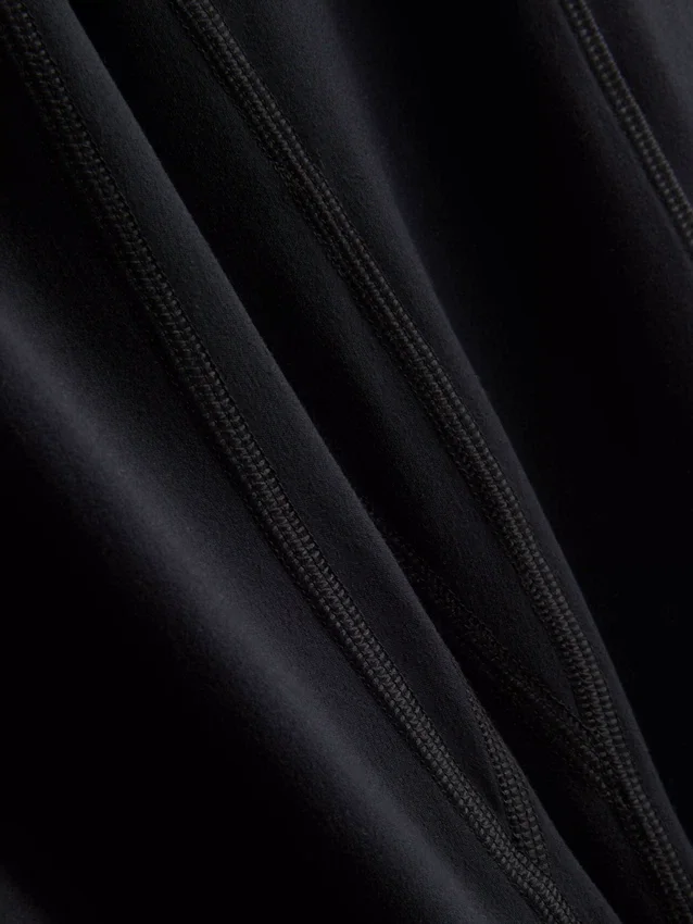 Hooggetailleerde, soepele sportlegging met ondersteuning