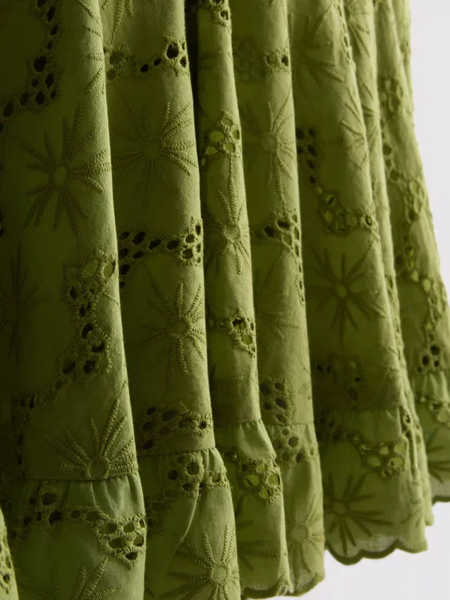Katoenen mini-jurk met ruches en oogjes