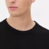 Katoenen T-shirt met omgezoomde hals en relaxte pasvorm