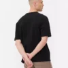 Katoenen T-shirt met omgezoomde hals en relaxte pasvorm