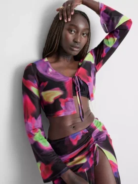 Korte mesh-top met strikdetail