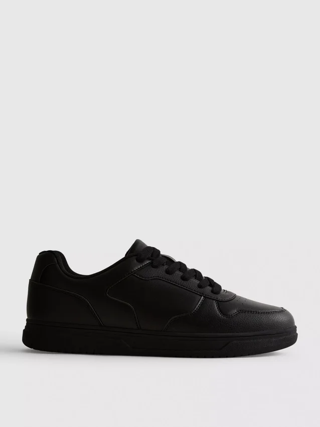 Lage sneakers met inzetstukken