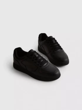 Lage sneakers met inzetstukken