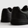 Lage sneakers met inzetstukken