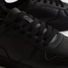 Lage sneakers met inzetstukken