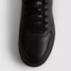 Lage sneakers met inzetstukken