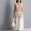 Lange, doorschijnende kanten cami-top