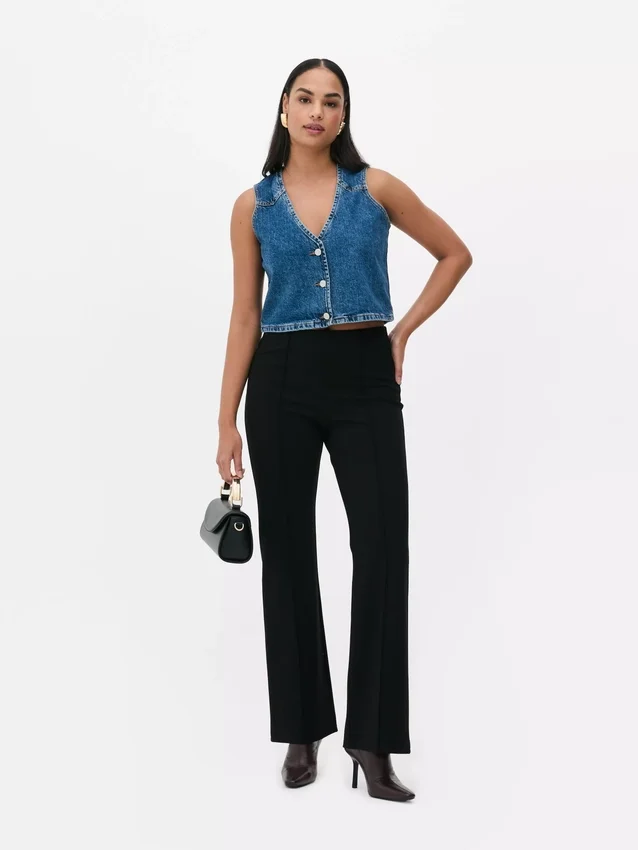 Mid-rise ponte-legging met uitlopende pijpen