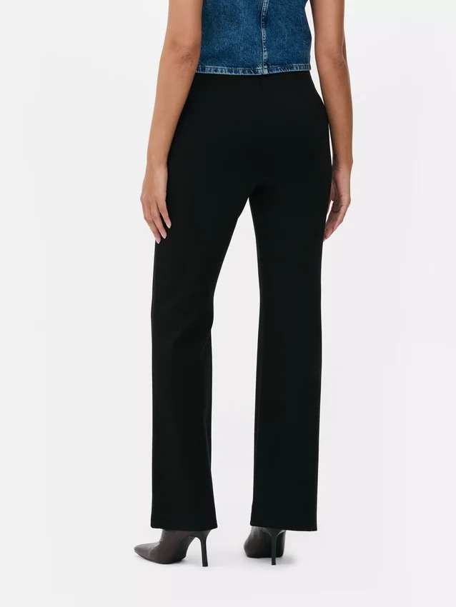 Mid-rise ponte-legging met uitlopende pijpen