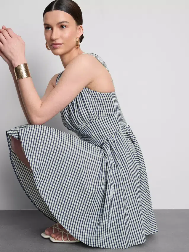 Mini-jurk met korset in gingham-motief