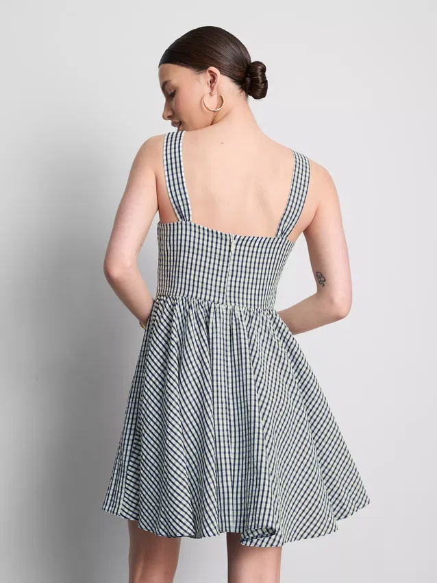 Mini-jurk met korset in gingham-motief
