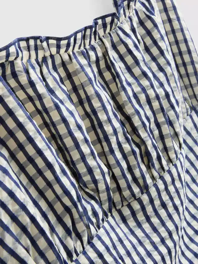 Mini-jurk met korset in gingham-motief