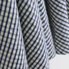 Mini-jurk met korset in gingham-motief