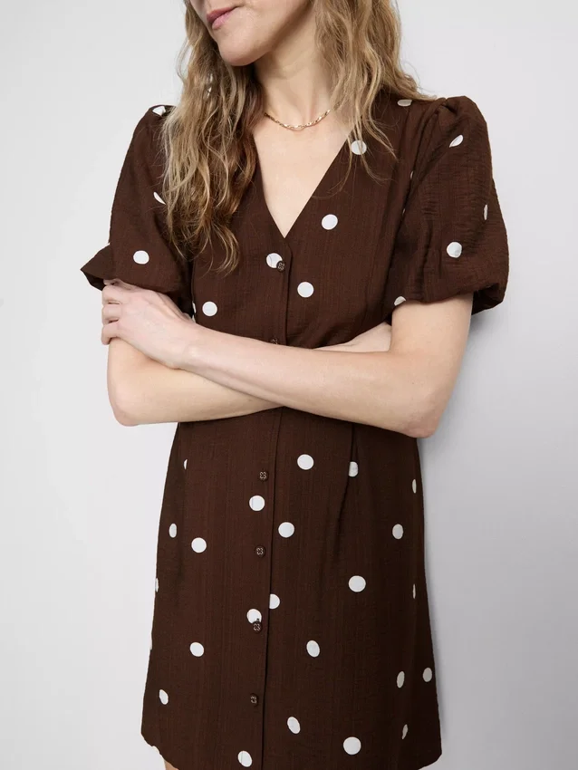 Mini-jurk met pofmouwen en knoopsluiting