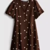 Mini-jurk met pofmouwen en knoopsluiting