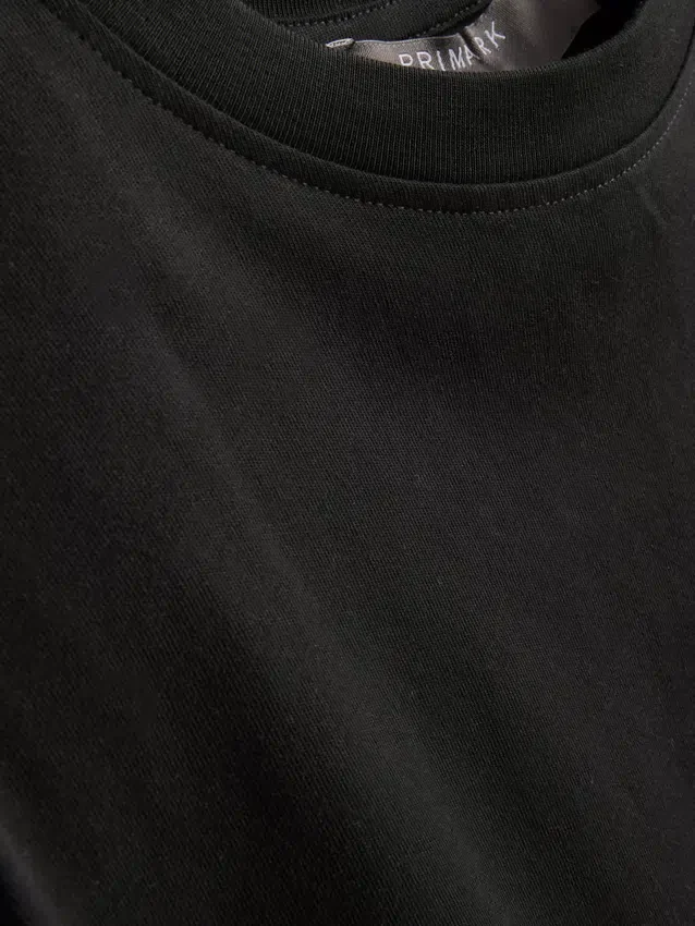 Mouwloos T-shirt met schoudervullingen